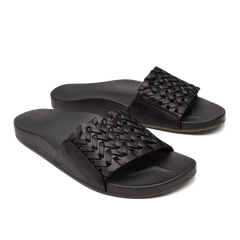 OluKai Women | Kāmola Women’s Leather Slide Sandals - Black