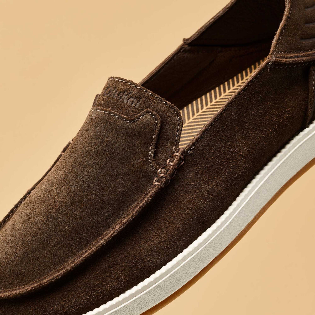 OluKai Men | Kākaha Nia Men‘s Suede Slip-On Shoes - Dark Wood