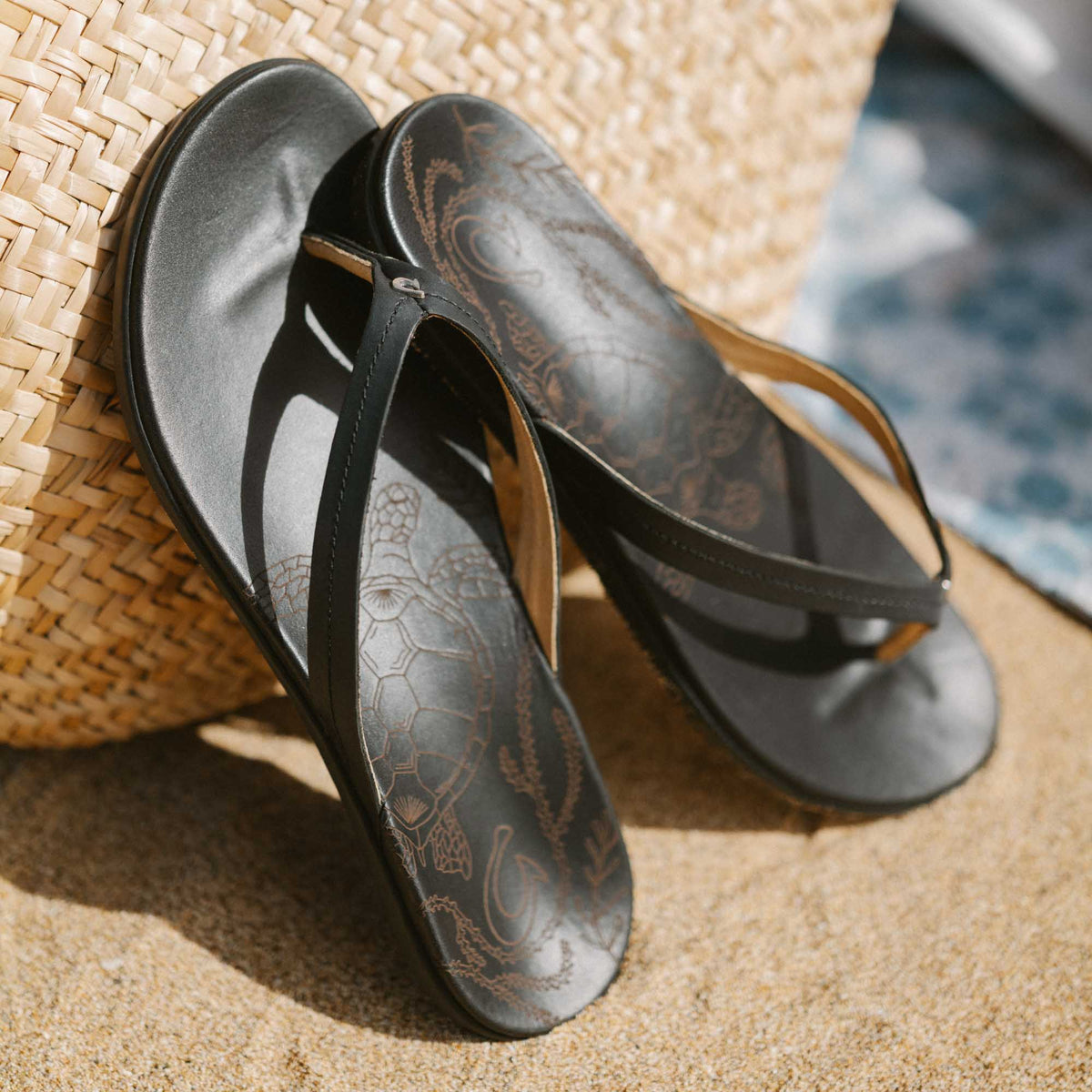 OluKai Women | Honu Women’s Leather Beach Sandals - Black