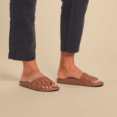 OluKai Women | Kāmola Women’s Leather Slide Sandals - Tan