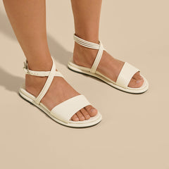 OluKai Women | Tiare Wrap Women’s Leather Sandals - White Sand