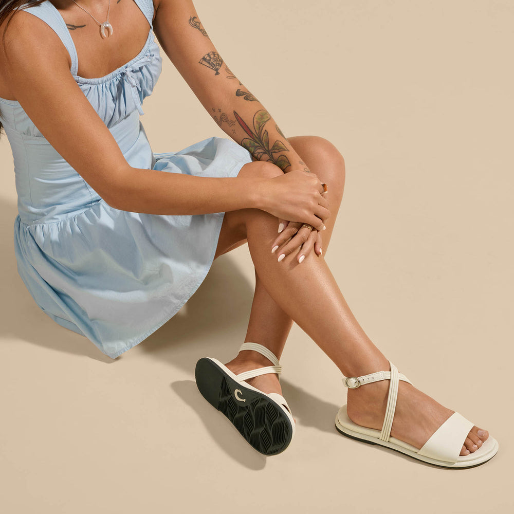 OluKai Women | Tiare Wrap Women’s Leather Sandals - White Sand